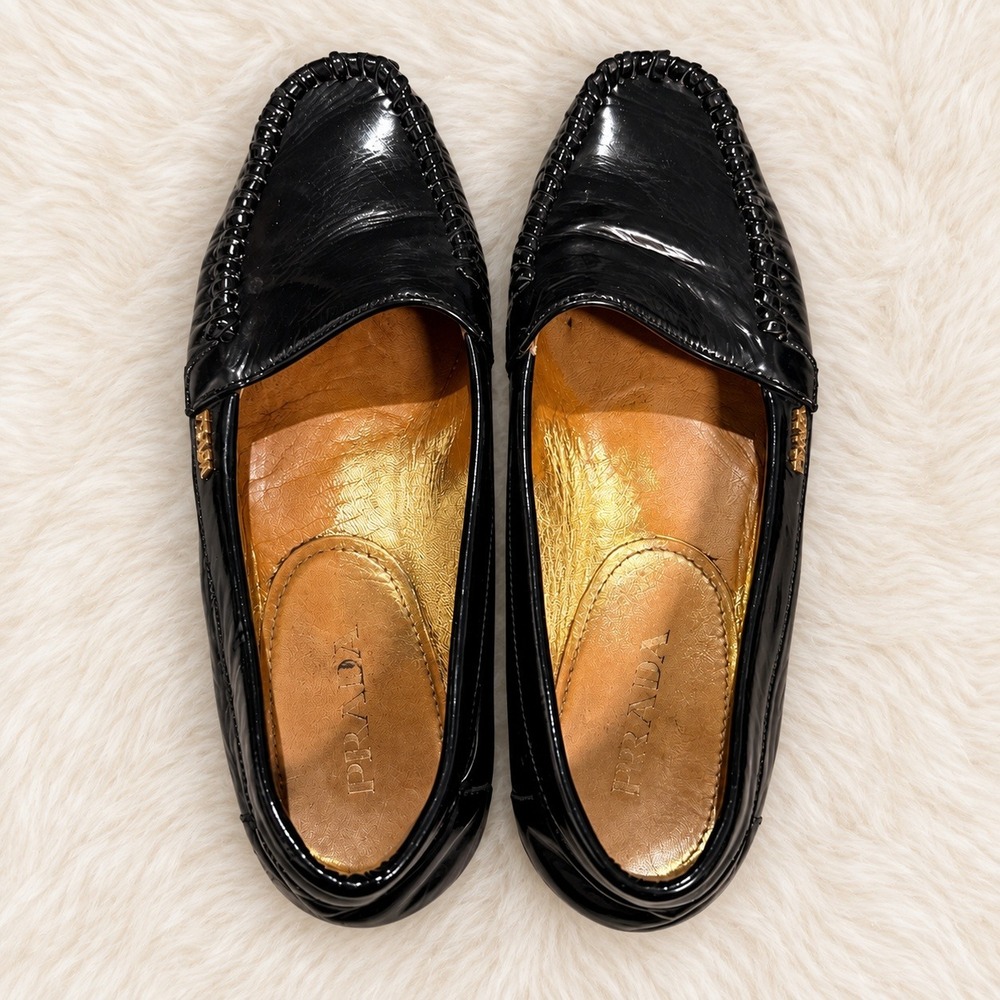 Prada Womens Black Leather Moccasin Loafers Flats Gold Logo w Dust Bag Size 36.5